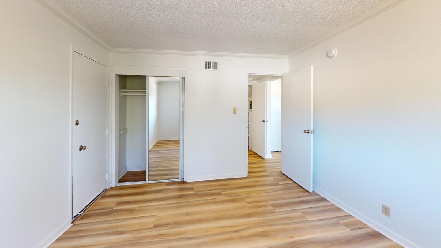 7 Merrydale Road San Rafael, CA 94903 - Photo 7 of 14 a view of a hallway with wooden floor and entryway