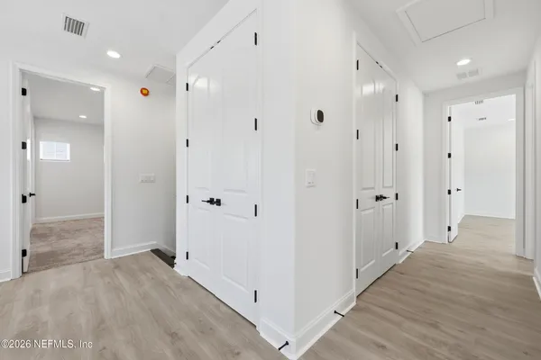 an empty room with windows