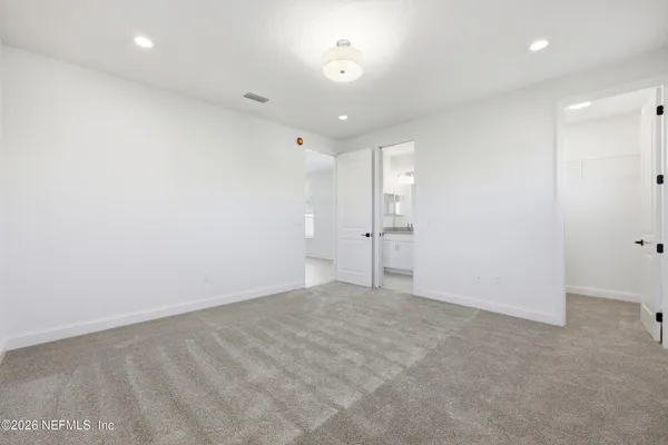 a view of a hallway with closet