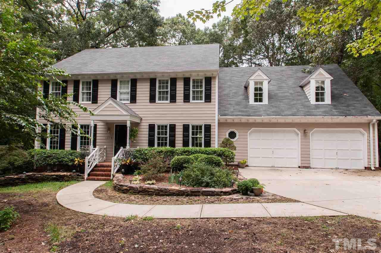 1316 October Road Raleigh, NC 27614 - Photo 1 of 25 a front view of a house with a yard