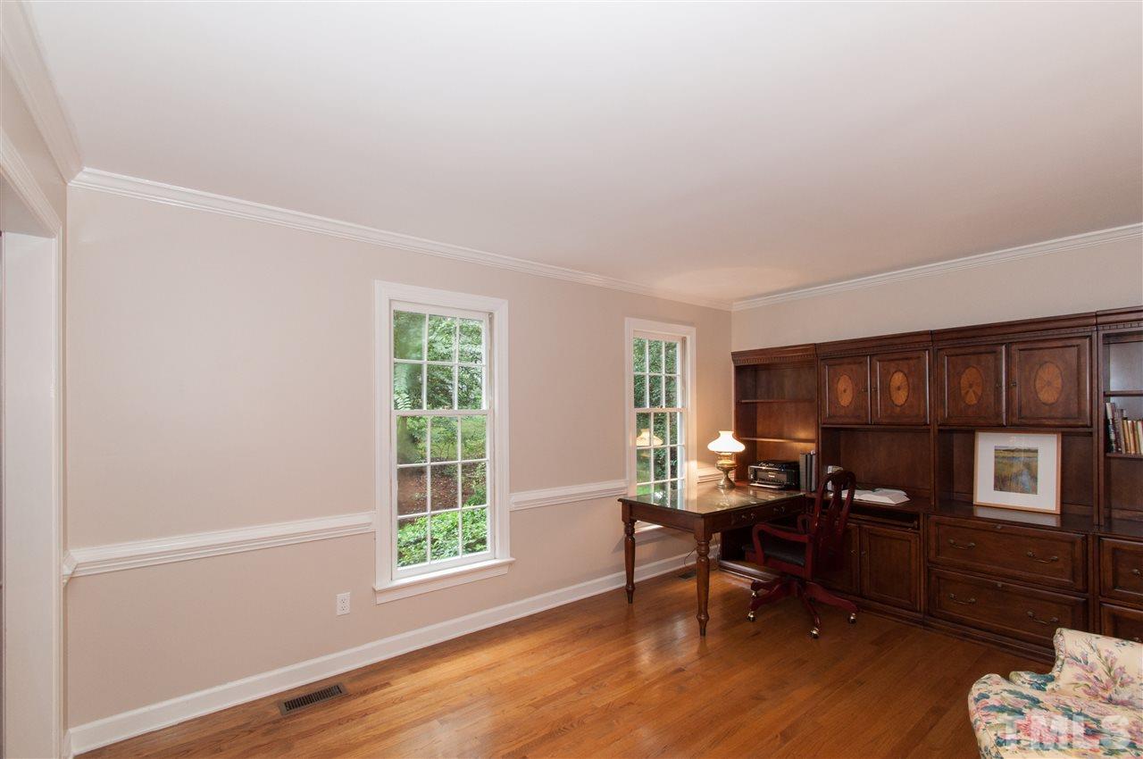 1316 October Road Raleigh, NC 27614 - Photo 13 of 25 a livingroom with workspace and a window
