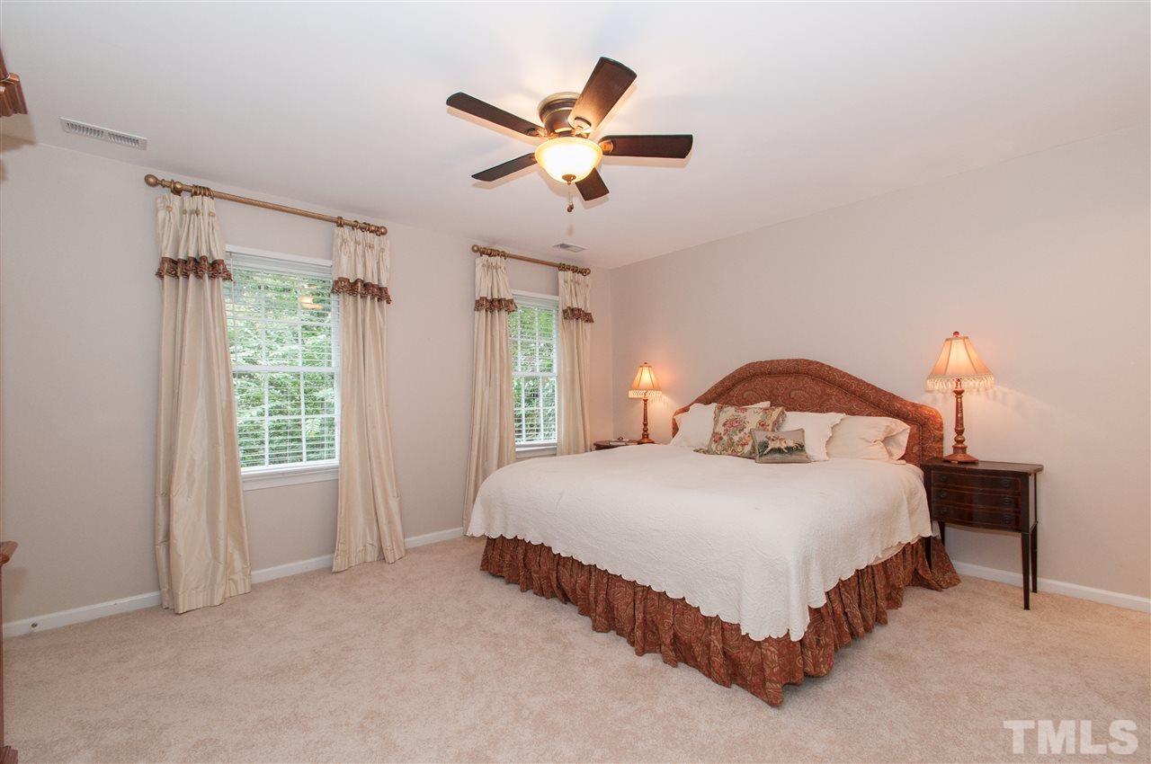 1316 October Road Raleigh, NC 27614 - Photo 14 of 25 a bedroom with bed and window
