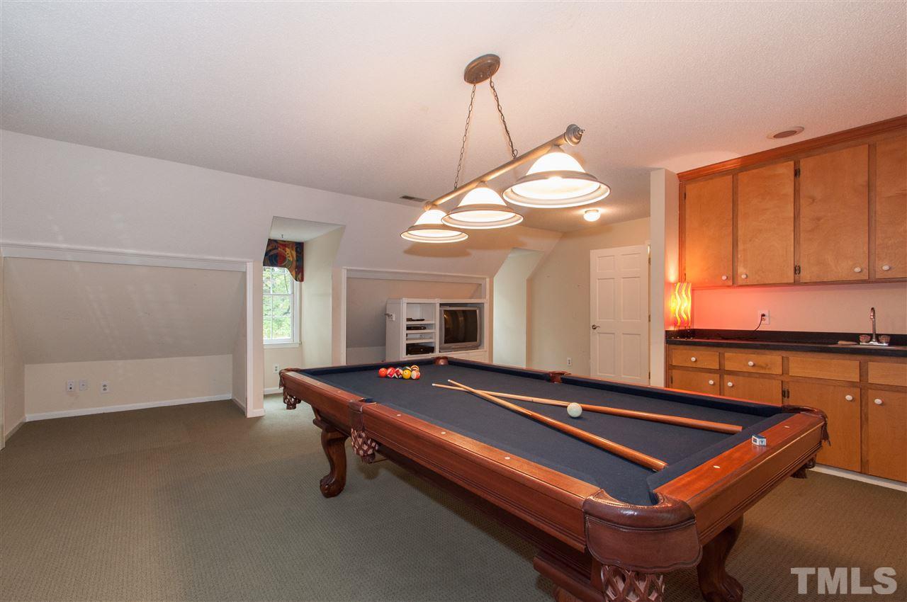 1316 October Road Raleigh, NC 27614 - Photo 21 of 25 a room with pool table and windows