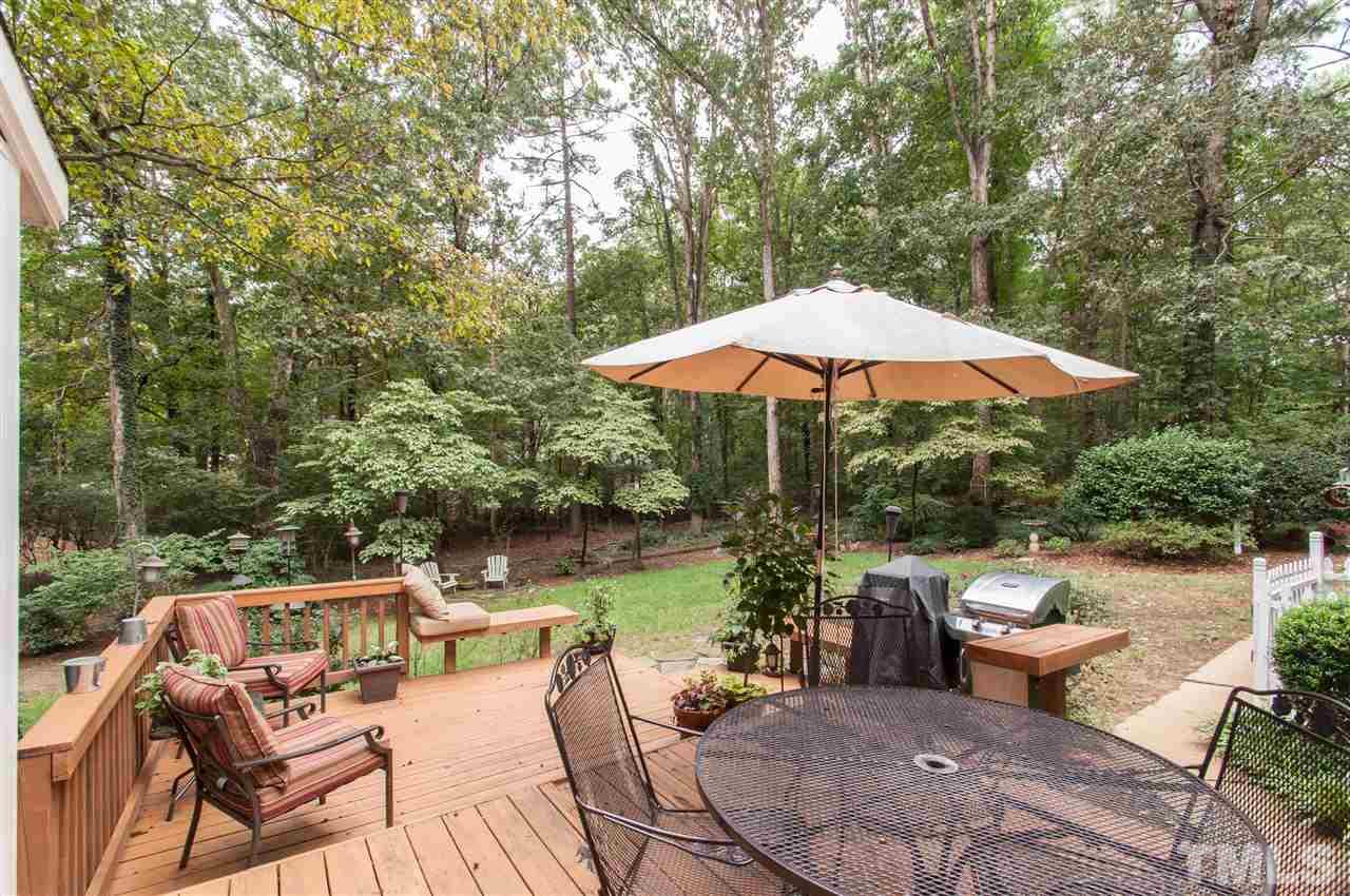 1316 October Road Raleigh, NC 27614 - Photo 25 of 25 a view of a patio with furniture and a backyard