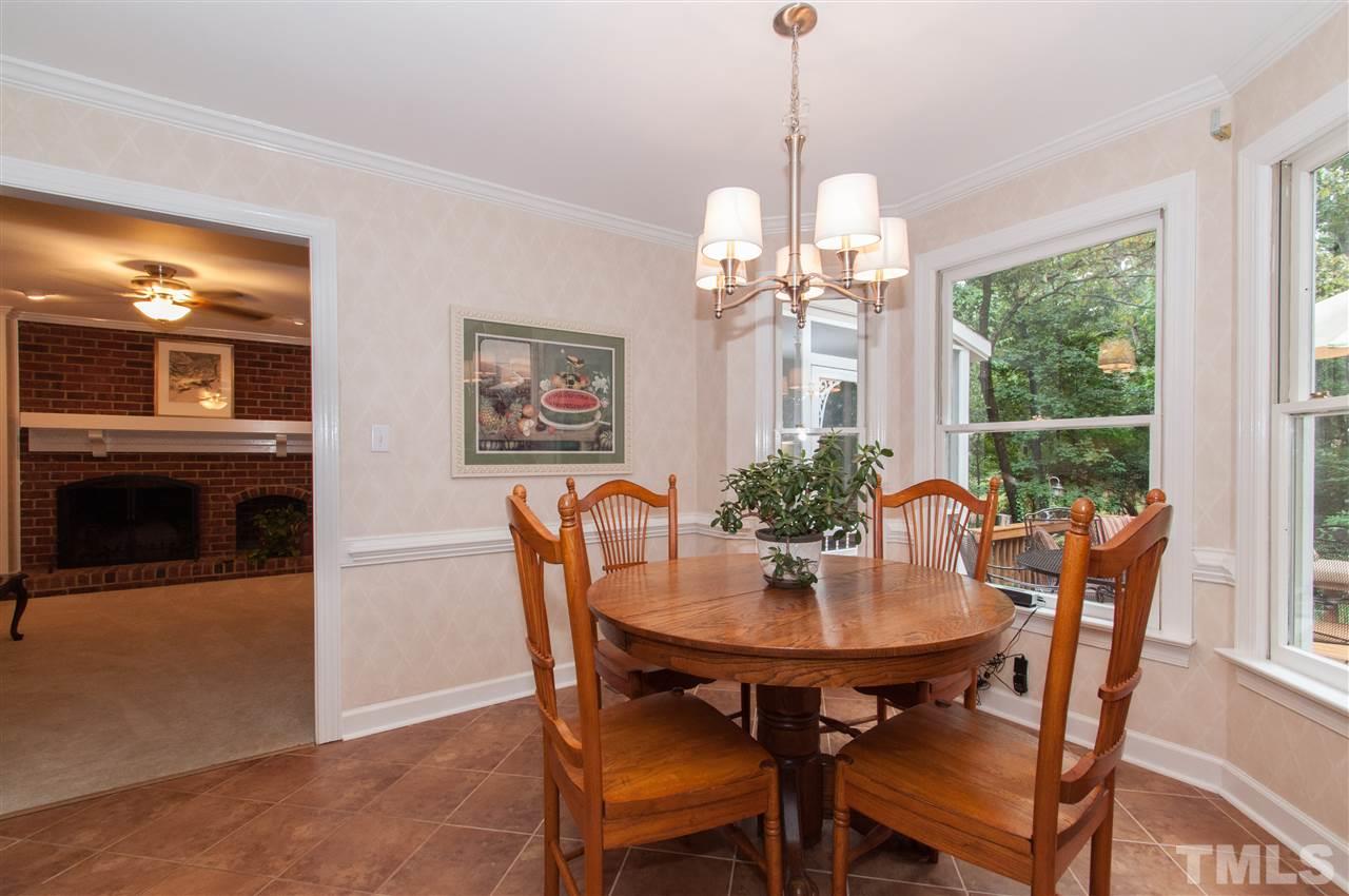 1316 October Road Raleigh, NC 27614 - Photo 8 of 25 a view of a dining room with furniture window and outside view