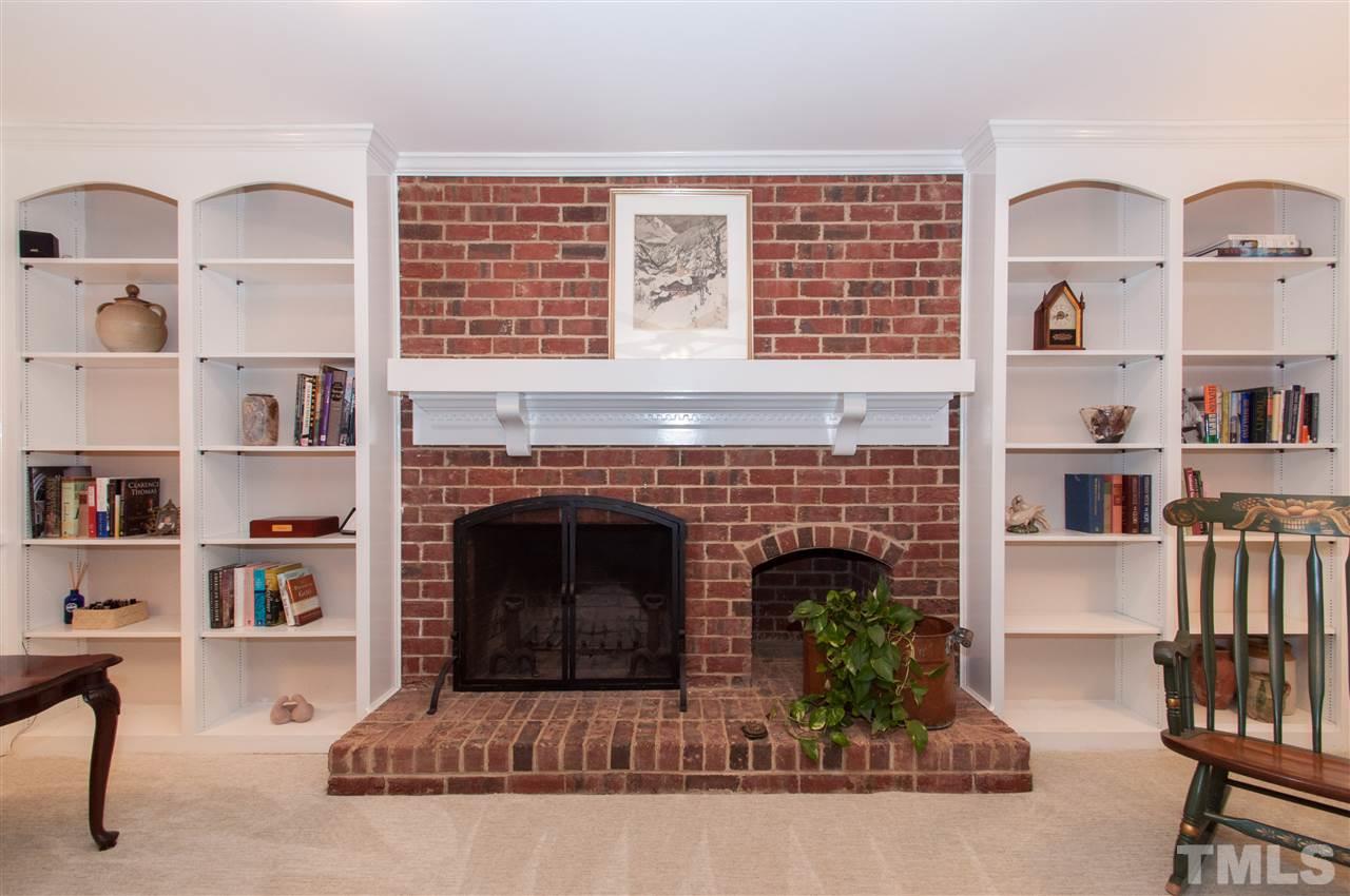 1316 October Road Raleigh, NC 27614 - Photo 10 of 25 a living room with furniture and a fireplace