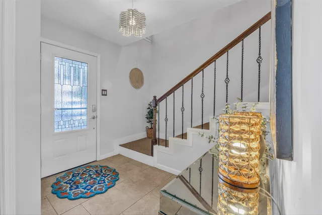 a view of entryway with wooden floor