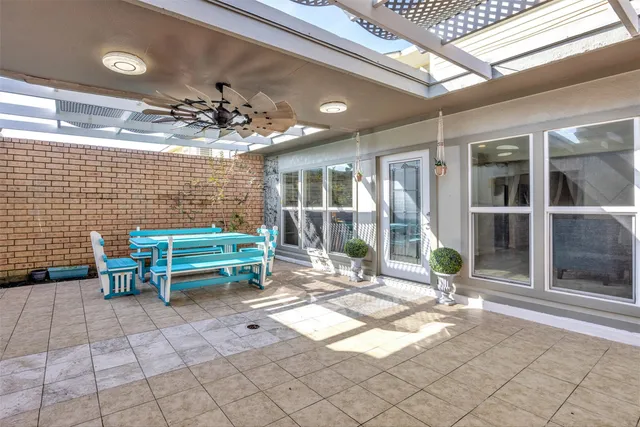 a bedroom with furniture and a rug