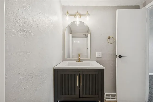 a sink with a mirror