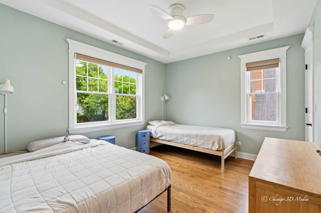 306 17th Street Wilmette, IL 60091 - Photo 32 of 48 a bedroom with two beds and a window