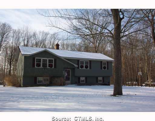 13 Regina Road Lisbon, CT 06351 - Photo 1 of 1 a front view of a house with a yard
