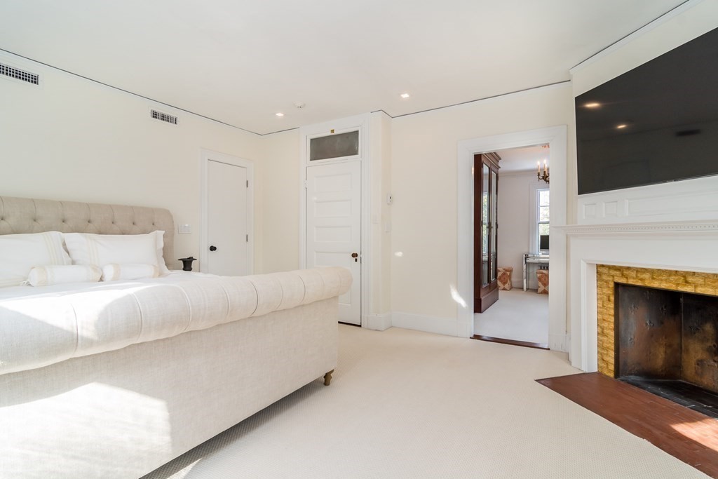 30 Cliff Road Wellesley, MA 02481 - Photo 11 of 30 a living room with furniture and a fireplace