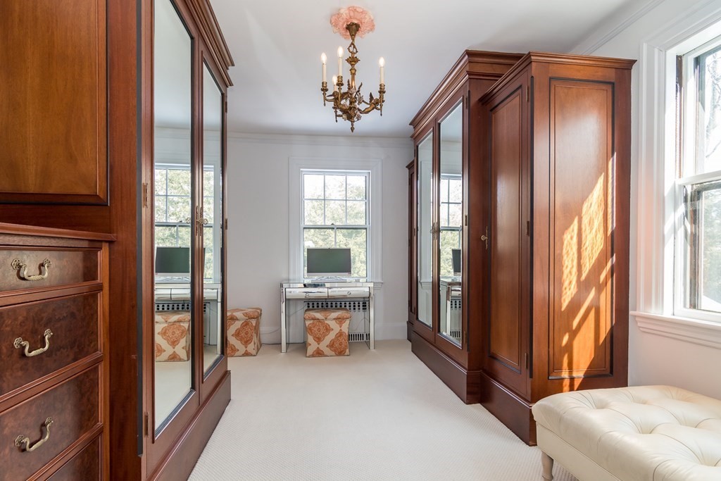 30 Cliff Road Wellesley, MA 02481 - Photo 13 of 30 a very nice looking bedroom with a large window and chandelier