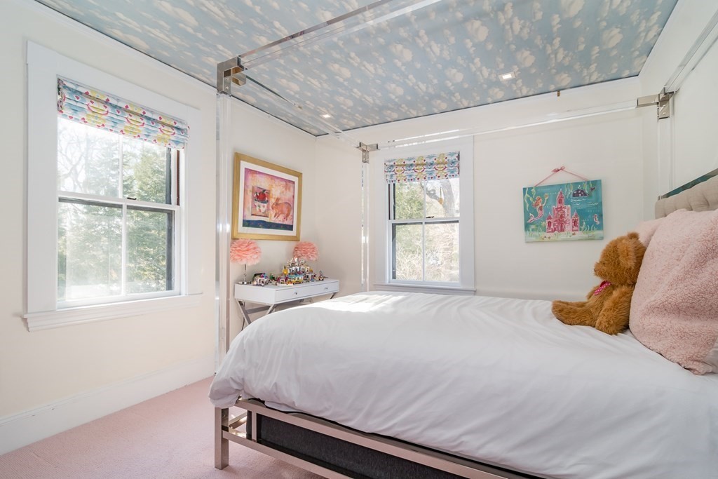 30 Cliff Road Wellesley, MA 02481 - Photo 15 of 30 a bedroom with a bed and wooden floor