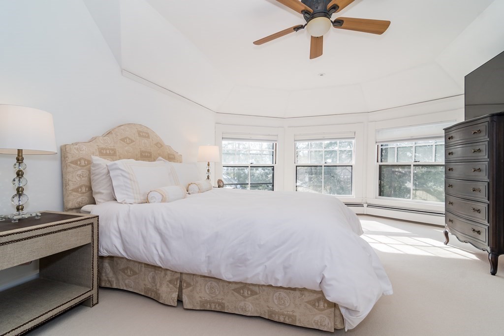 30 Cliff Road Wellesley, MA 02481 - Photo 17 of 30 a bedroom with a bed and window