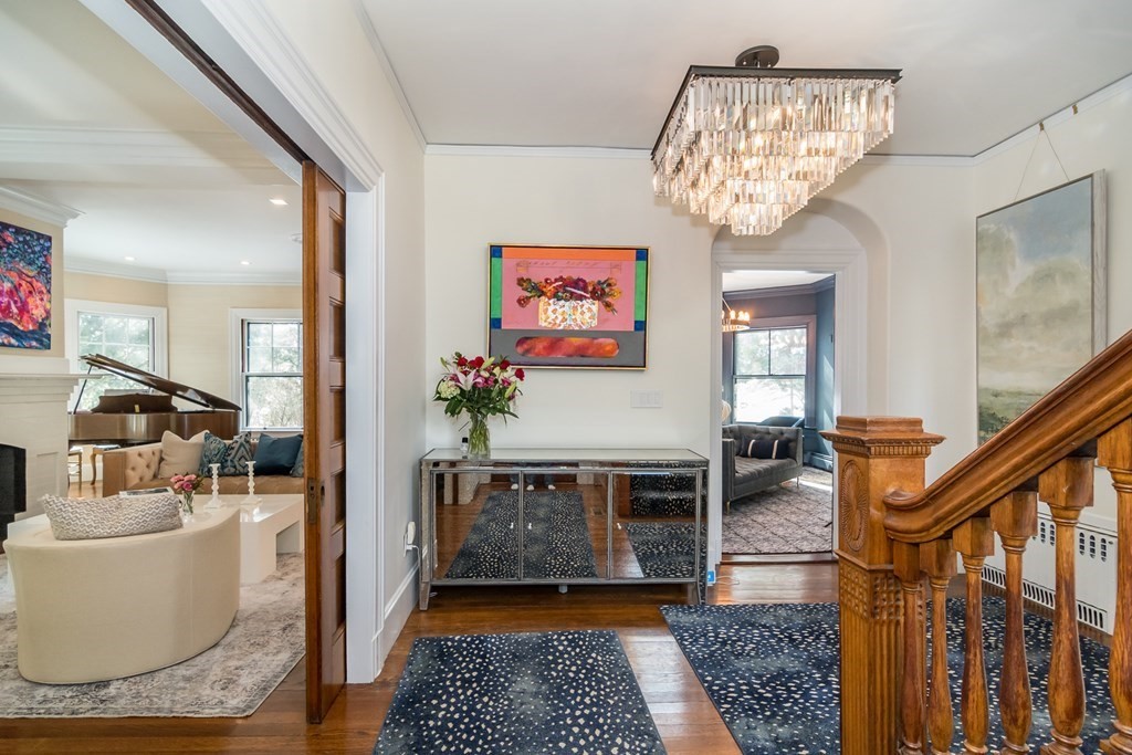 30 Cliff Road Wellesley, MA 02481 - Photo 2 of 30 a living room with furniture and a chandelier