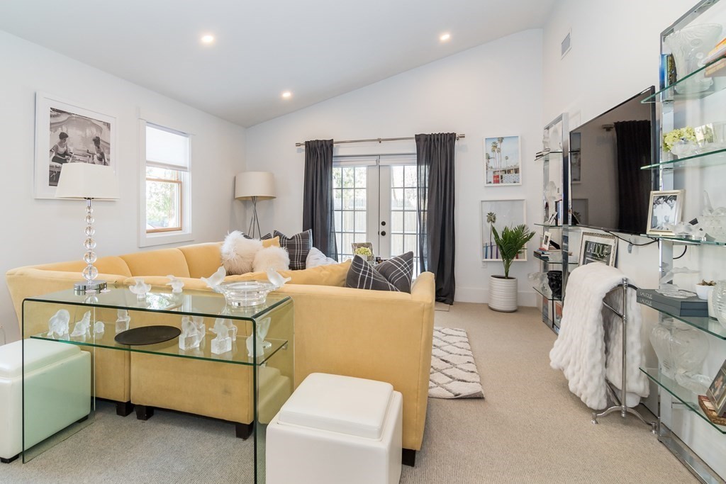 30 Cliff Road Wellesley, MA 02481 - Photo 25 of 30 a living room with furniture and a flat screen tv