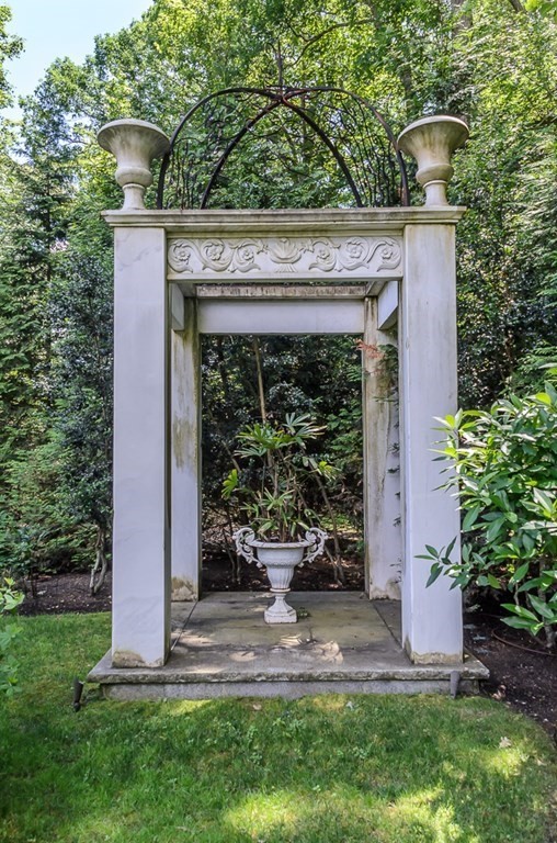 30 Cliff Road Wellesley, MA 02481 - Photo 28 of 30 a front view of a house with garden