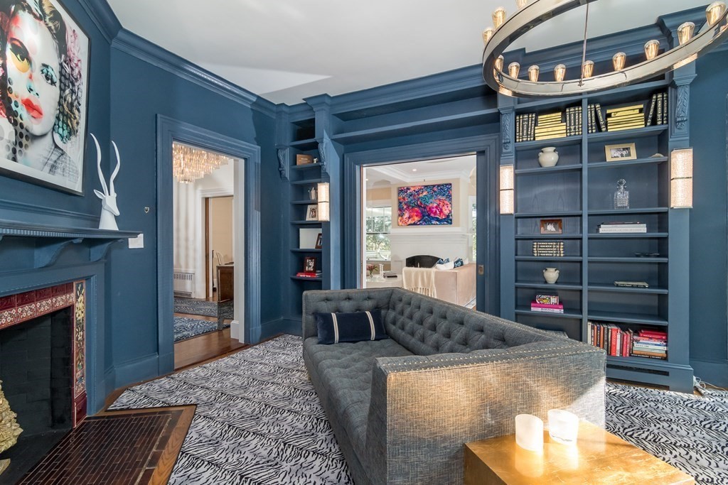 30 Cliff Road Wellesley, MA 02481 - Photo 8 of 30 a living room with stainless steel appliances furniture a fireplace and a flat screen tv