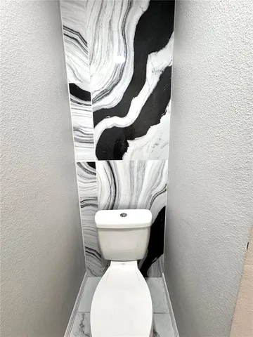 a close up of a toilet