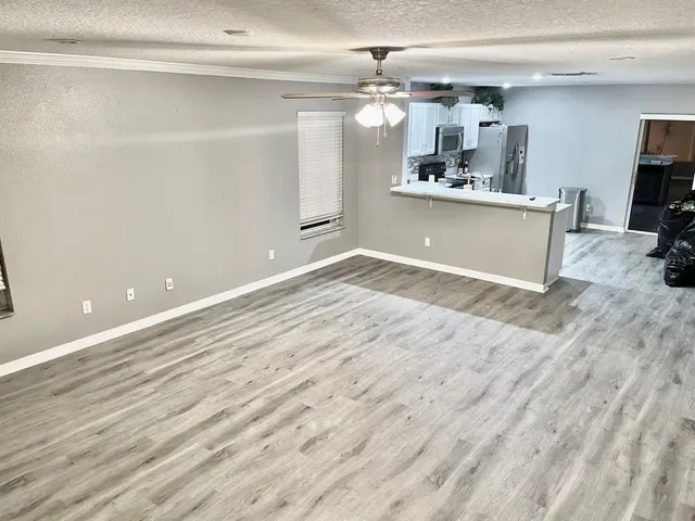 a view of a kitchen with a sink