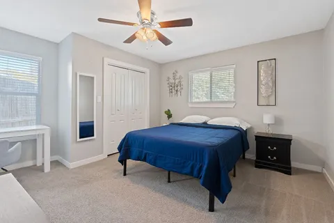 a bathroom with a sink a vanity and a mirror