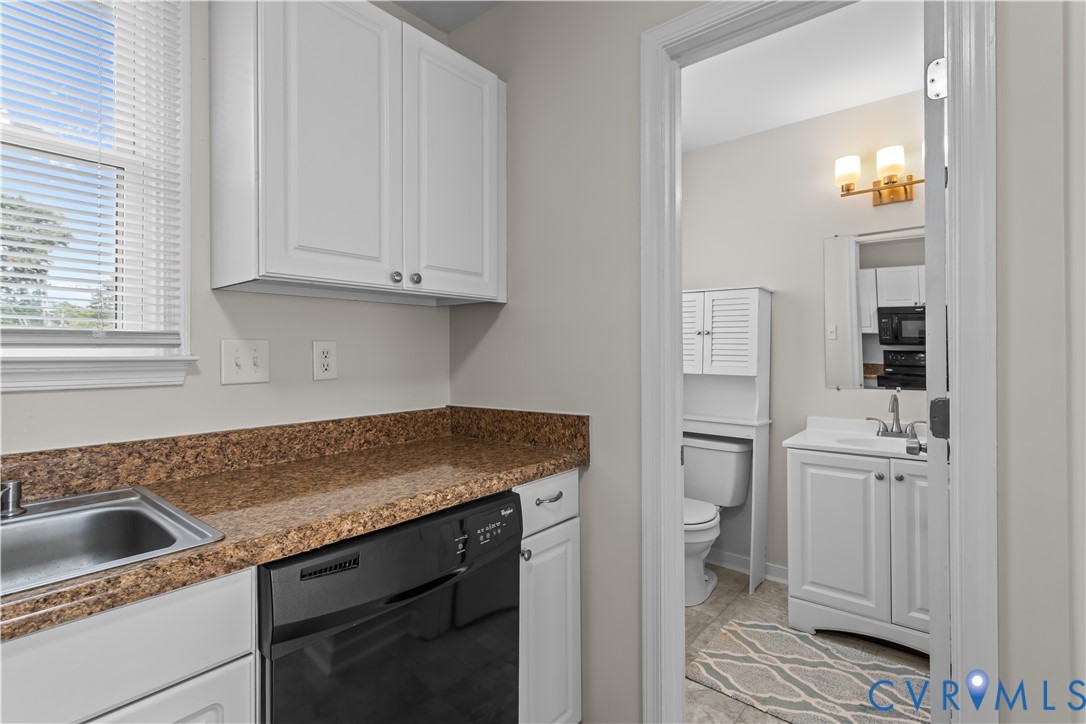 4801 Penick Road Richmond, VA 23228 - Photo 15 of 39 Half bathroom featuring vanity and toilet