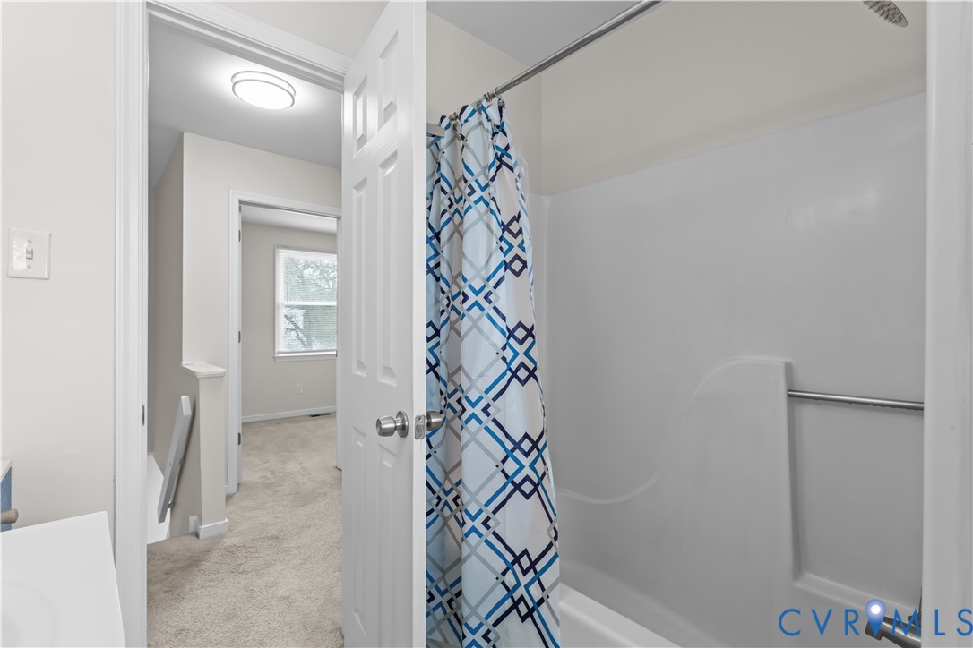 4801 Penick Road Richmond, VA 23228 - Photo 30 of 39 Bathroom featuring shower / tub combo