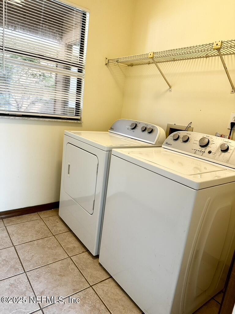 11368 Canvasback Court Jacksonville, FL 32225 - Photo 19 of 19 a utility room with dryer and washer