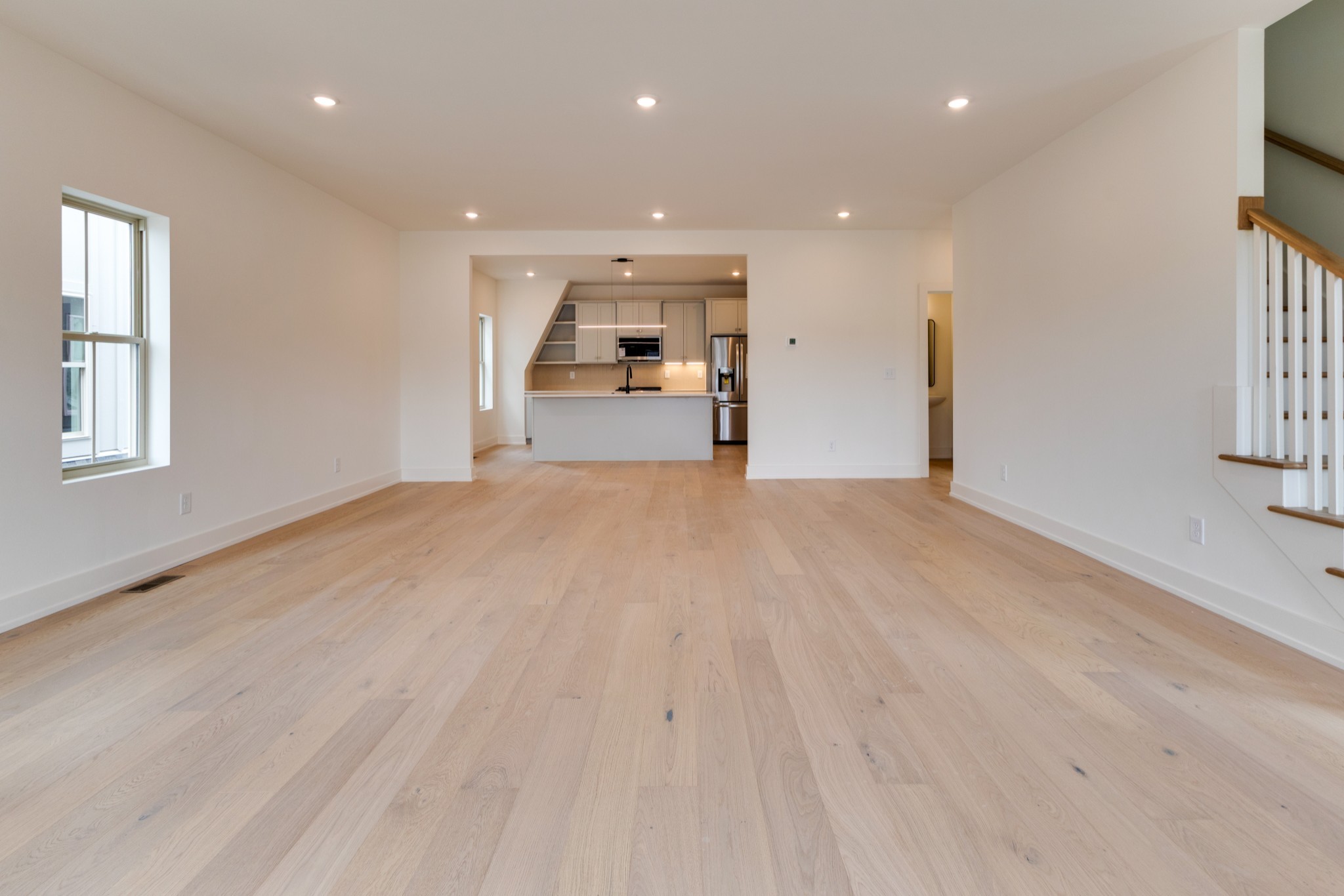 533 Midnight Way Nashville, TN 37209 - Photo 10 of 42 a view of a kitchen with wooden floor and windows