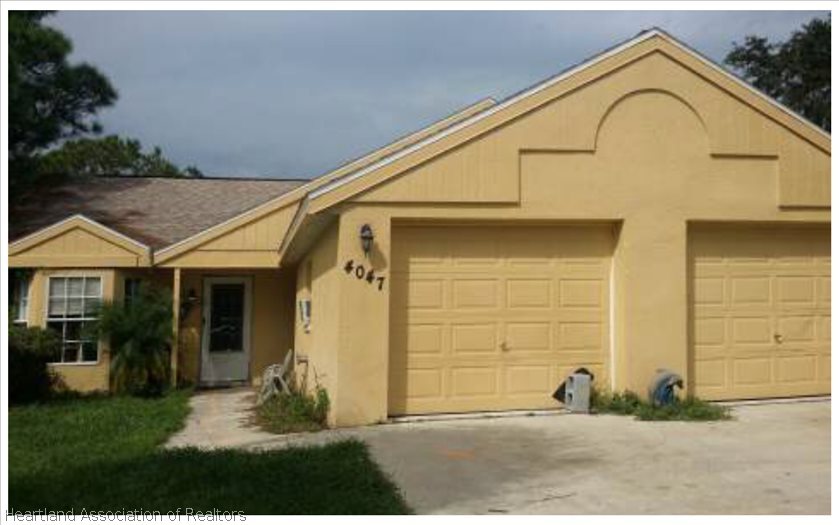 4047 Leaf Road Sebring, FL 33875 - Photo 1 of 1 a view of a house with backyard