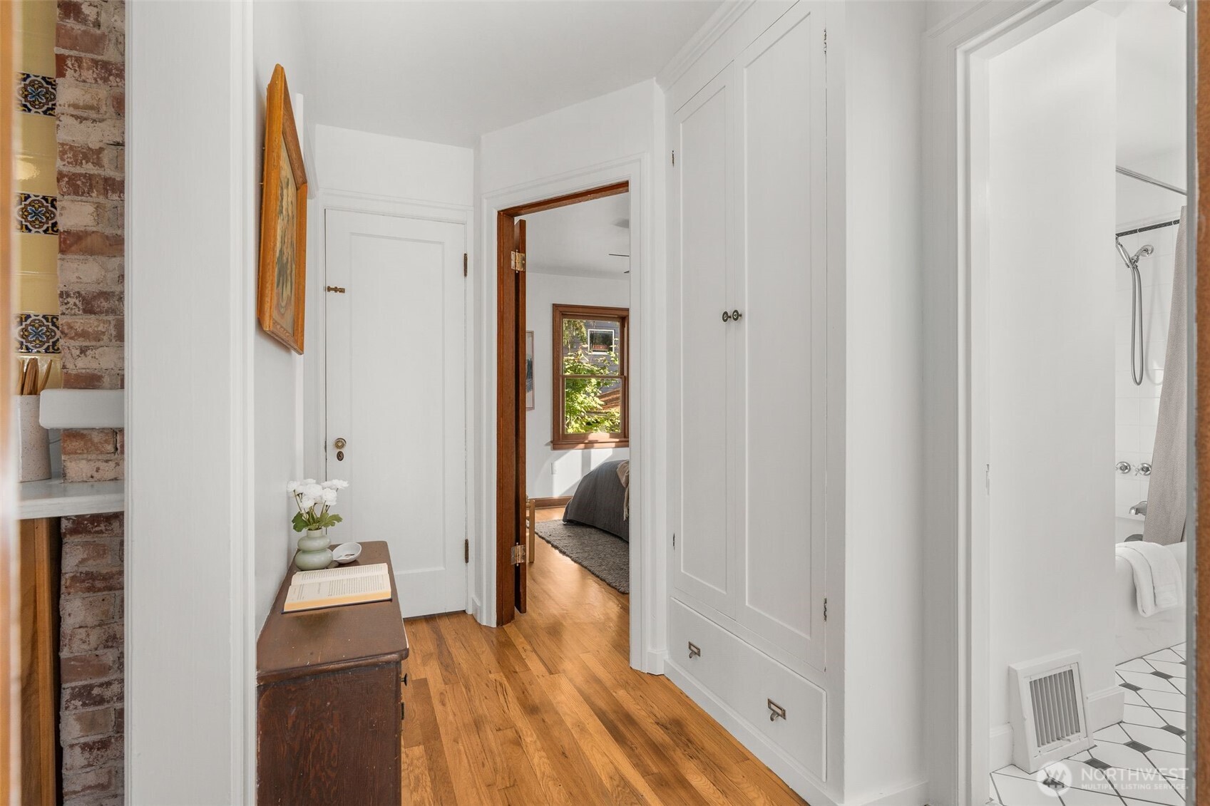 8606 29th Avenue Northwest Seattle, WA 98117 - Photo 12 of 33 a view of a bedroom from a hallway