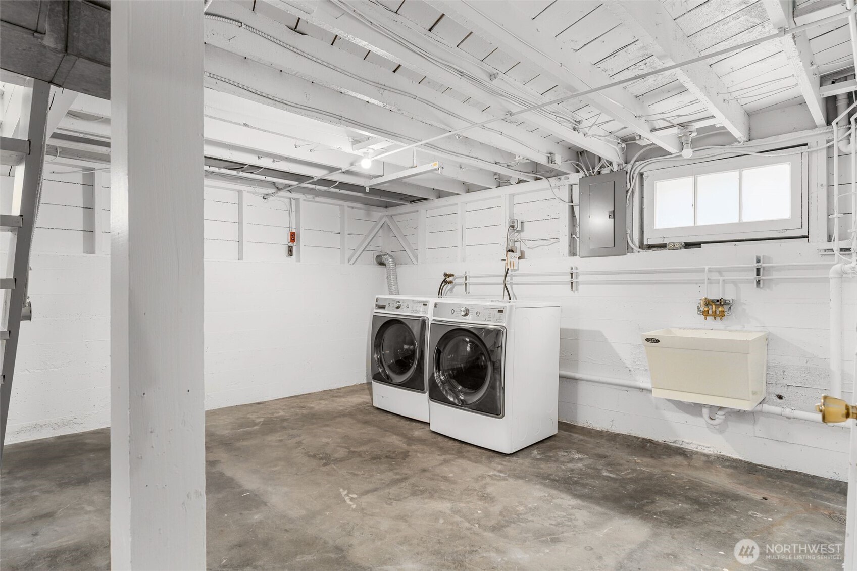 8606 29th Avenue Northwest Seattle, WA 98117 - Photo 16 of 33 a utility room with dryer and washer