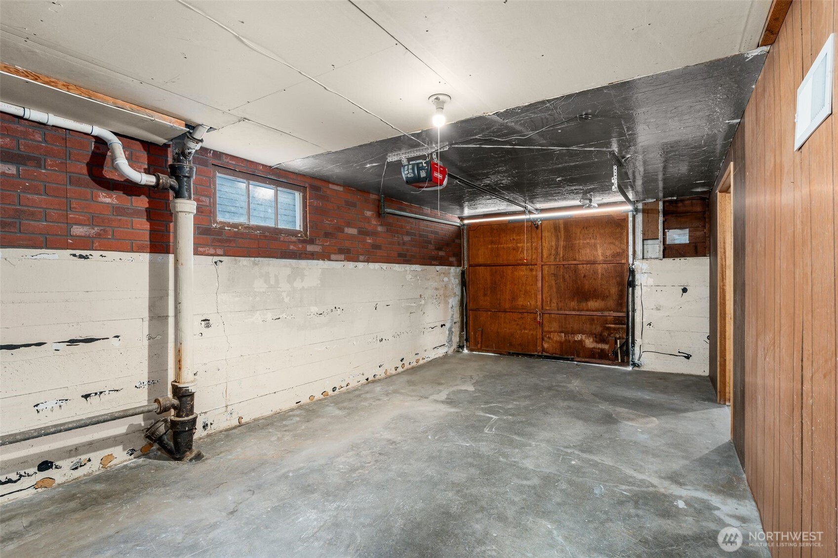 8606 29th Avenue Northwest Seattle, WA 98117 - Photo 19 of 33 a view of storage and utility room