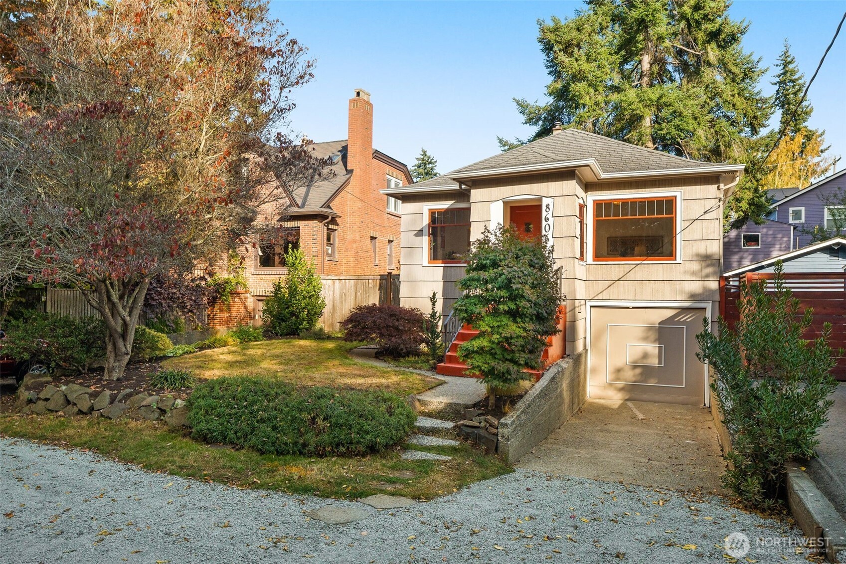 8606 29th Avenue Northwest Seattle, WA 98117 - Photo 20 of 33 a front view of a house with garden