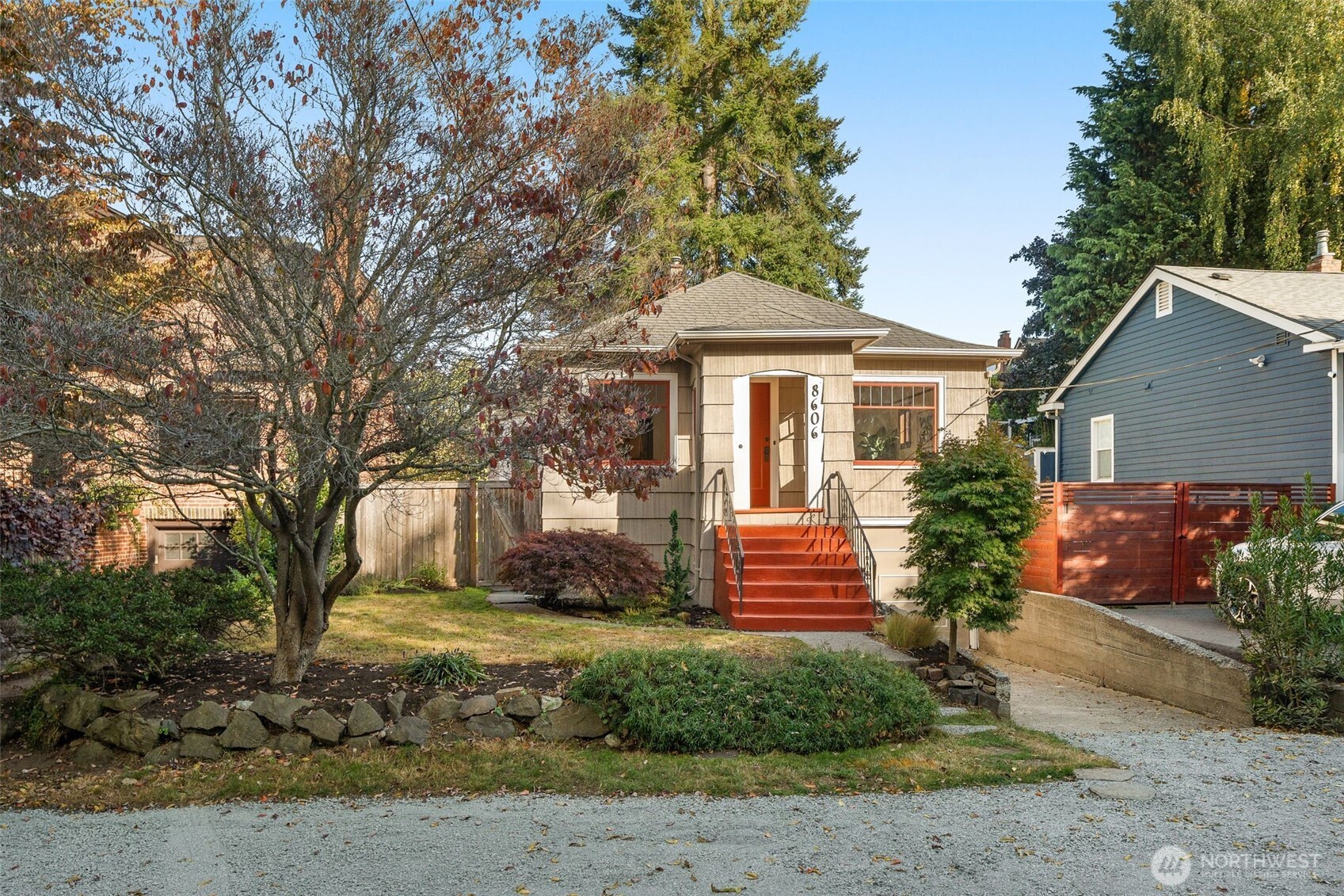 8606 29th Avenue Northwest Seattle, WA 98117 - Photo 21 of 33 a front view of a house with a yard