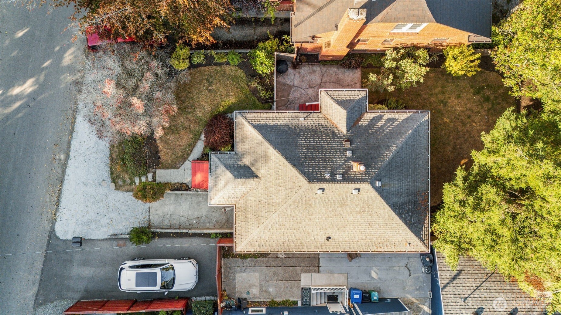 8606 29th Avenue Northwest Seattle, WA 98117 - Photo 27 of 33 an aerial view of a house with a yard
