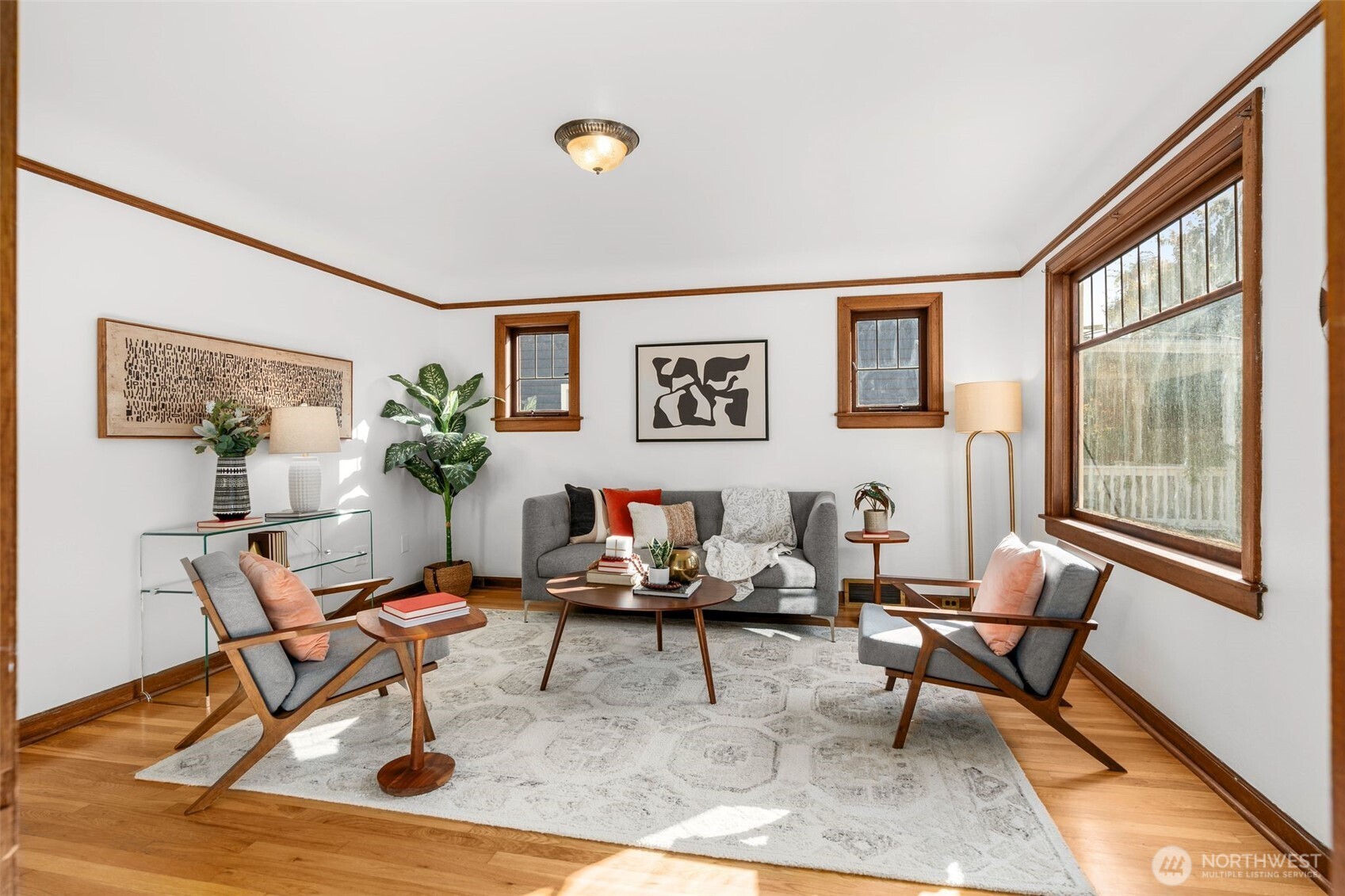 8606 29th Avenue Northwest Seattle, WA 98117 - Photo 3 of 33 a living room with furniture and a window
