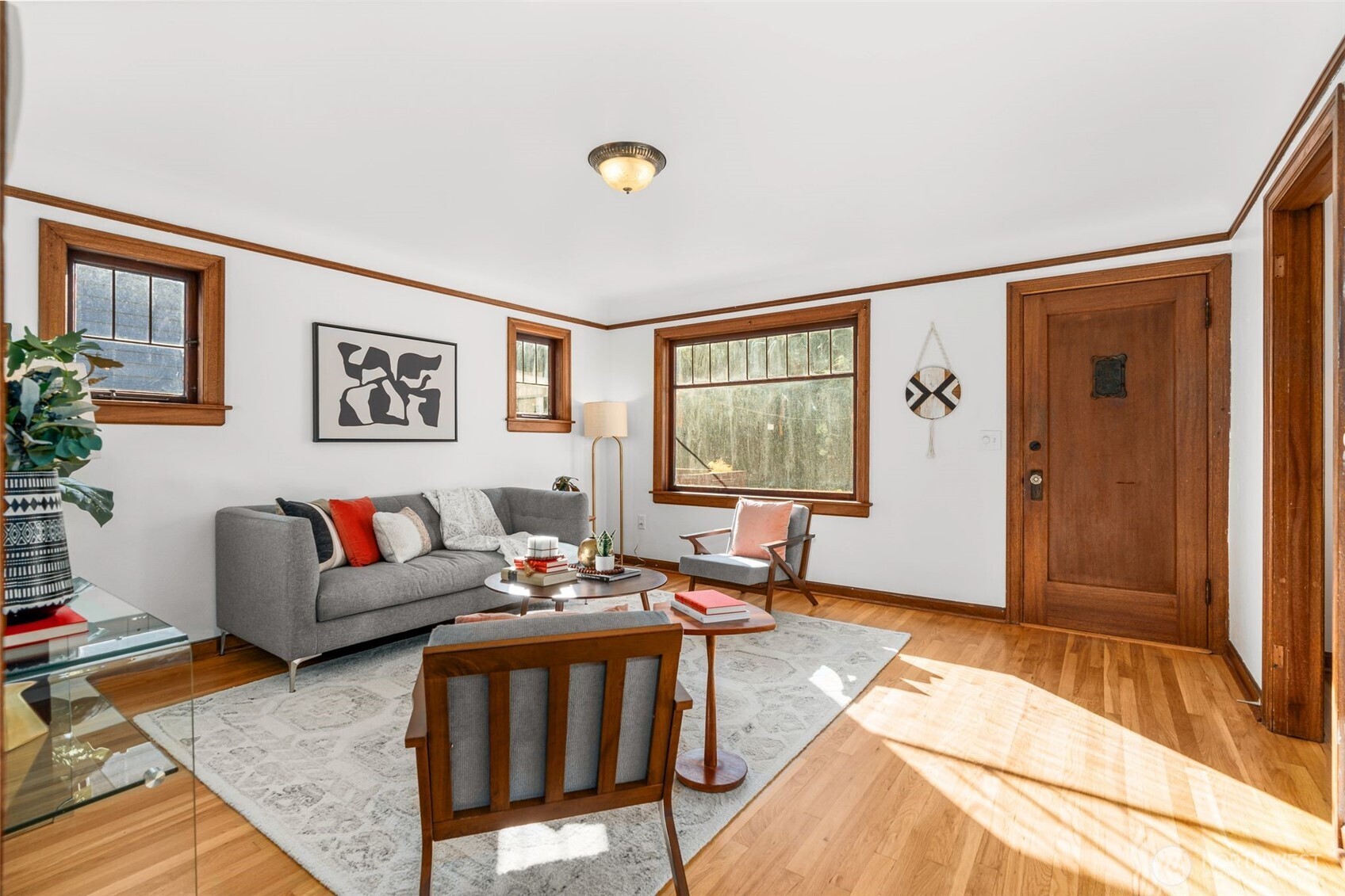 8606 29th Avenue Northwest Seattle, WA 98117 - Photo 5 of 33 a living room with furniture and a window