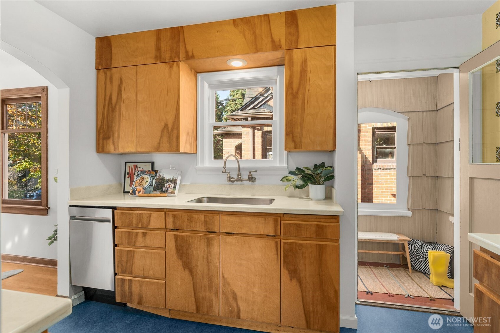 8606 29th Avenue Northwest Seattle, WA 98117 - Photo 9 of 33 a bathroom with a sink and a mirror