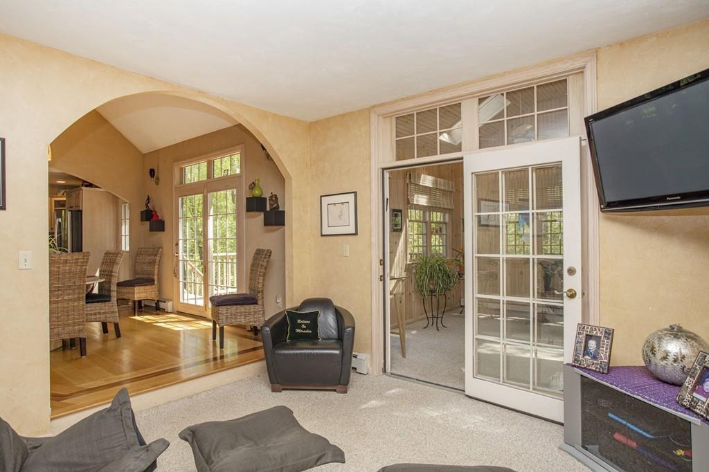 50 Lady Slipper Road Bridgewater, MA 02324 - Photo 15 of 37 a living room with furniture windows and flat screen tv