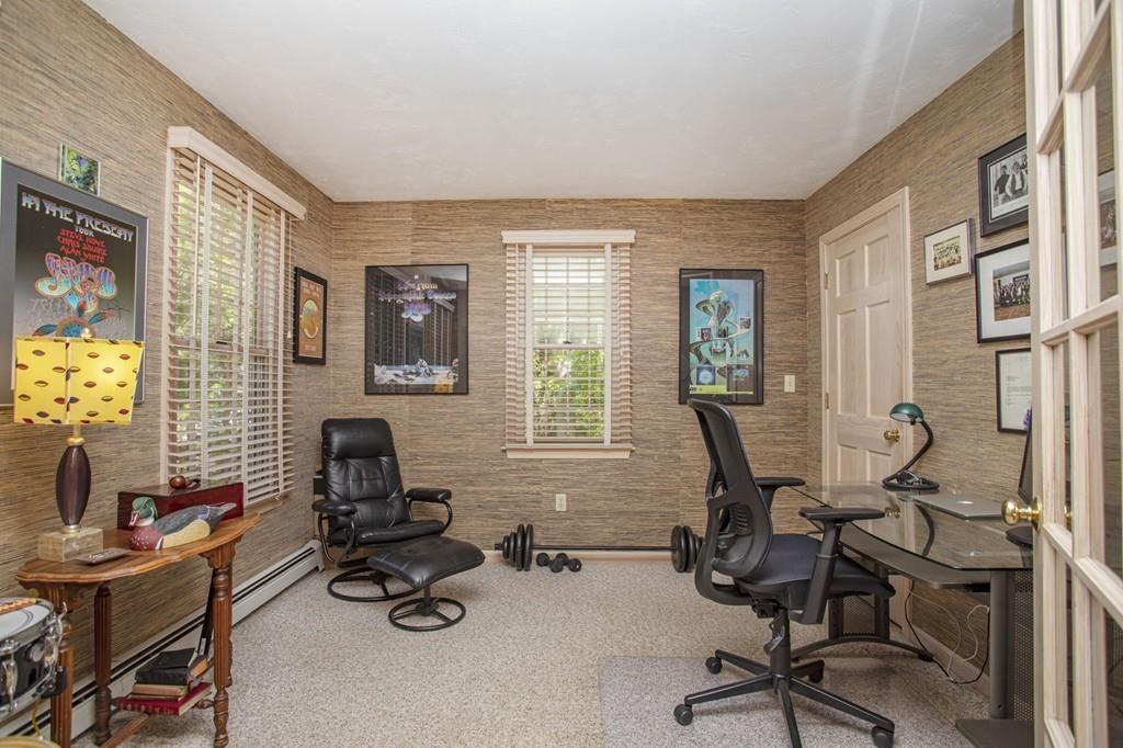50 Lady Slipper Road Bridgewater, MA 02324 - Photo 17 of 37 a view of a workspace with furniture and a window