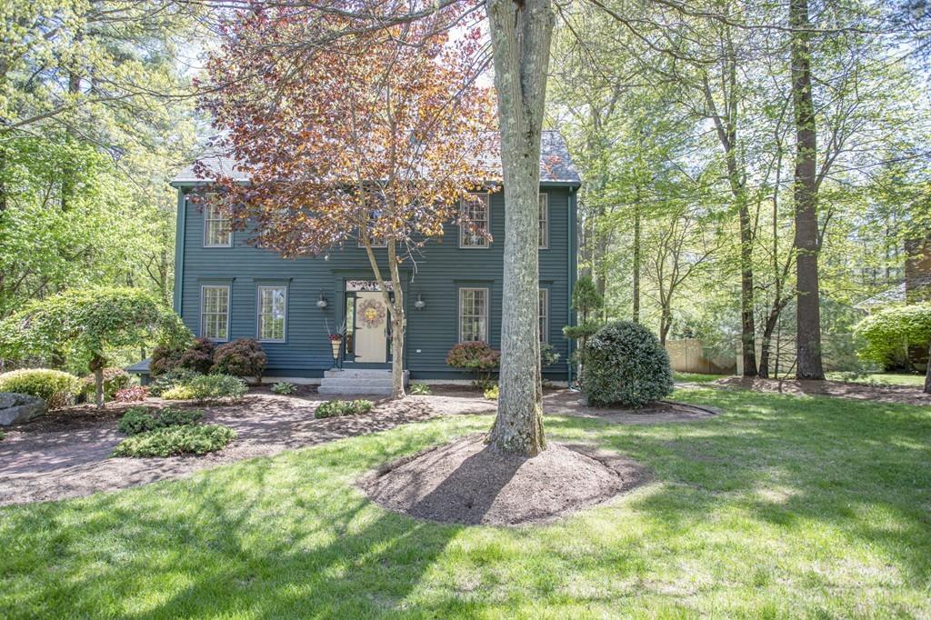 50 Lady Slipper Road Bridgewater, MA 02324 - Photo 2 of 37 a front view of a house with garden and trees