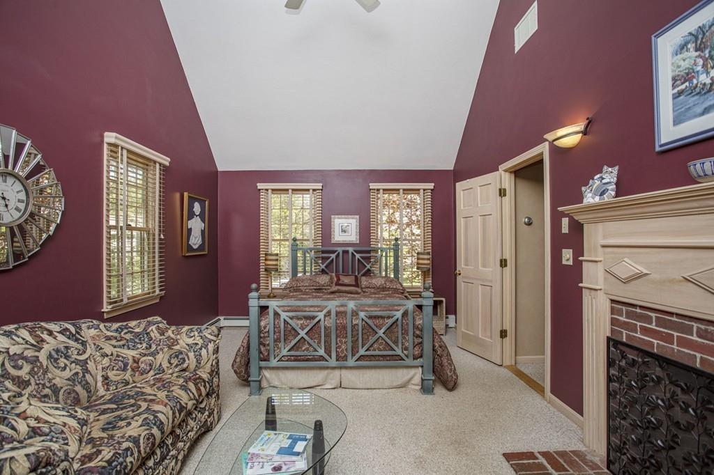 50 Lady Slipper Road Bridgewater, MA 02324 - Photo 22 of 37 a view of a livingroom with furniture and windows