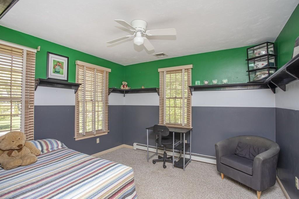 50 Lady Slipper Road Bridgewater, MA 02324 - Photo 28 of 37 a bedroom with furniture and a window