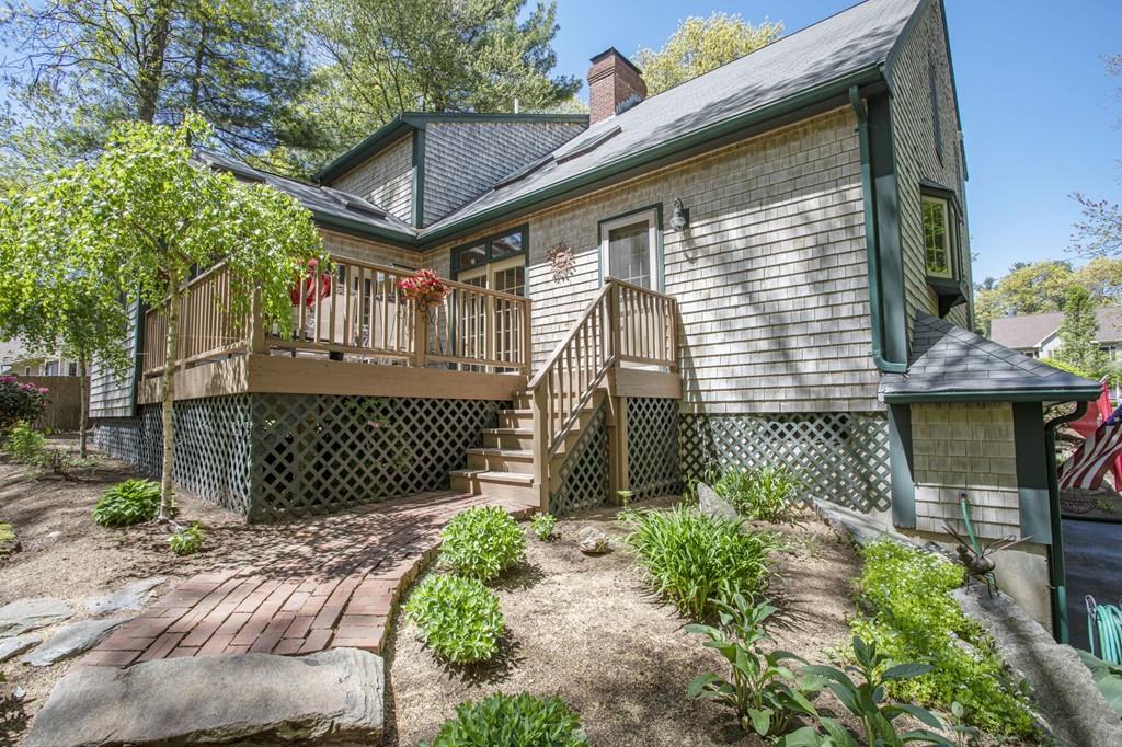 50 Lady Slipper Road Bridgewater, MA 02324 - Photo 5 of 37 a front view of a house with a garden
