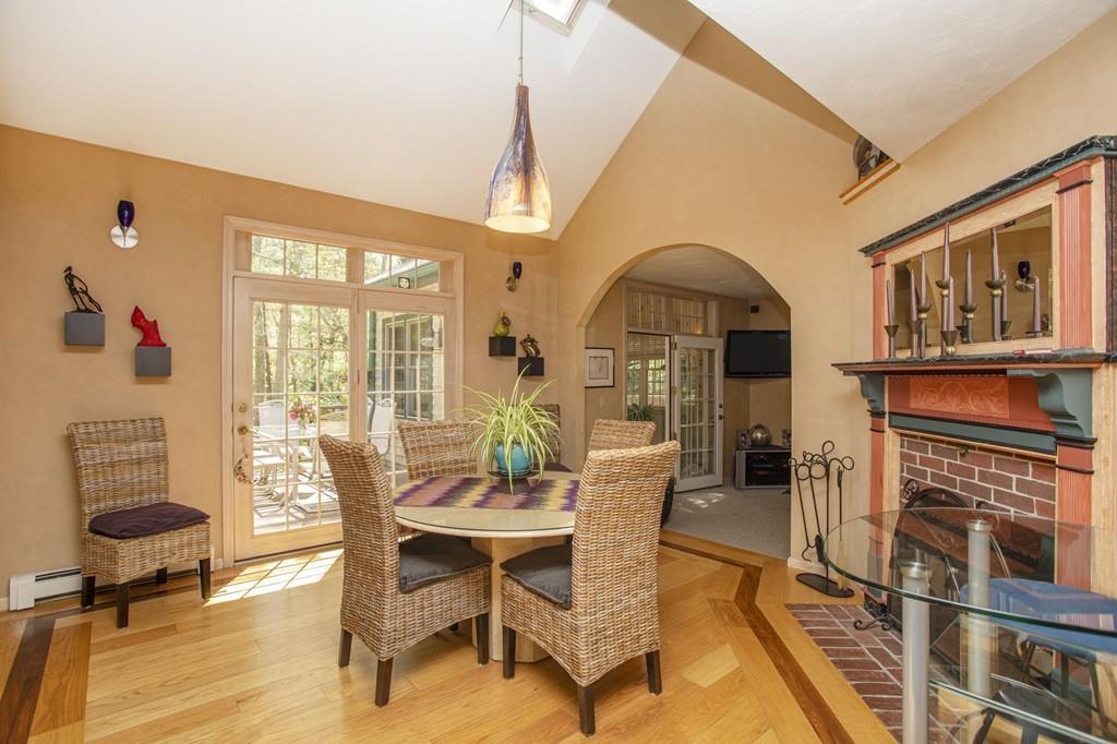 50 Lady Slipper Road Bridgewater, MA 02324 - Photo 10 of 37 a dining room with furniture window and wooden floor