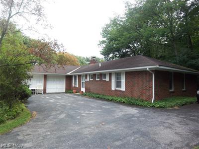 Brick ranch built to last!  Two car attached garage with additional parking on the side.