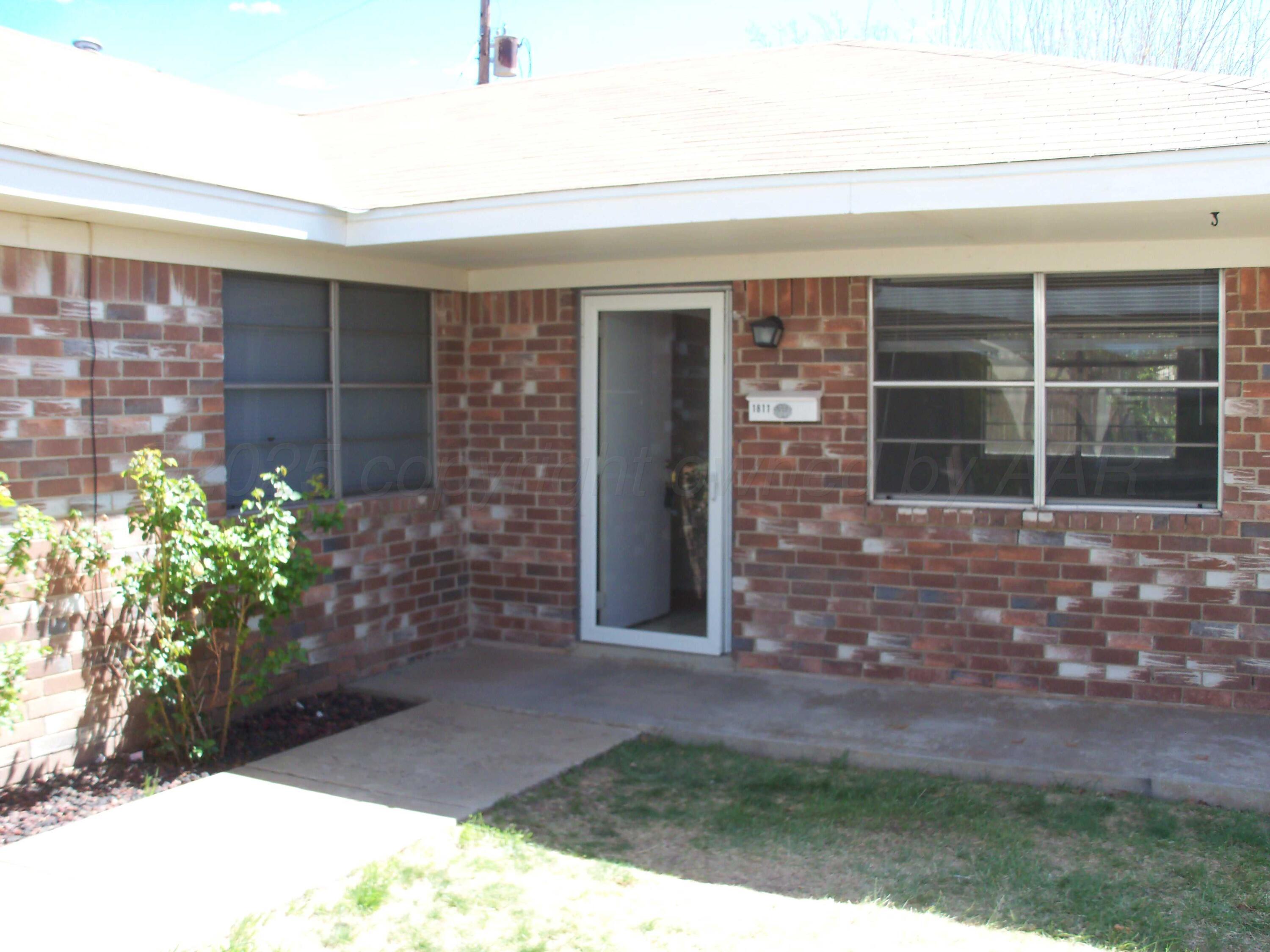 1811 Wisdom Drive Amarillo, TX 79106 - Photo 1 of 4 front 50 per cent