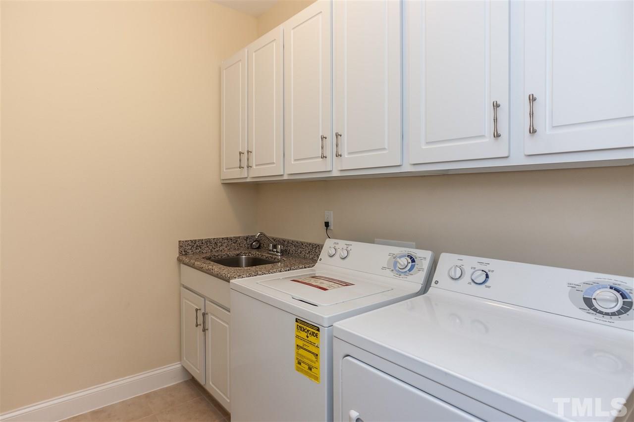 1553 Fullerton Place Raleigh, NC 27607 - Photo 13 of 25 a utility room with dryer and washer